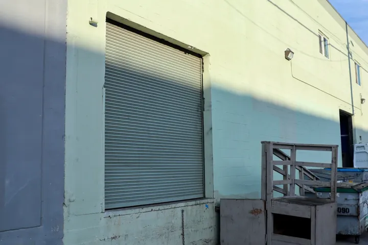 One of the two dock-high loading doors outside the kitchen